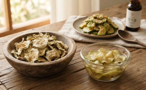 Dried Korean zucchini slices (hobak-goji) beside a bowl of rehydrated zucchini and finished hobak-namul